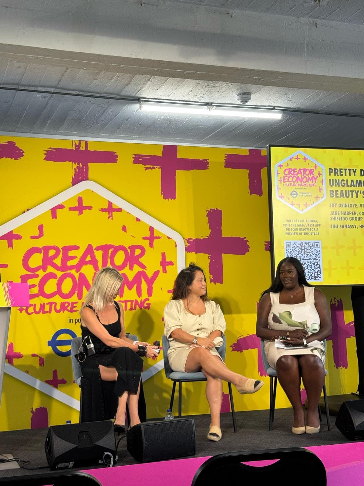 Joy Osinloye speaking on a panel at MAD//Fest in London