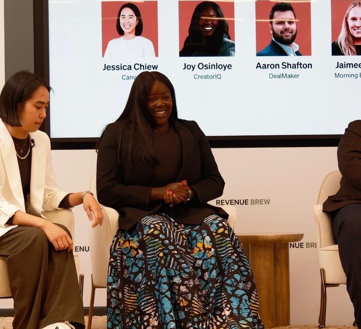 Joy Osinloye speaking on a panel at Revenue Brew